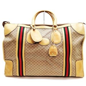 Gucci sherry Beige and Tan Travel Bag with Red and Green Stripes. Lock key
